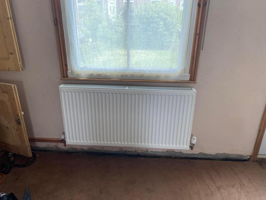 Repaired white radiator by Hodges Heating