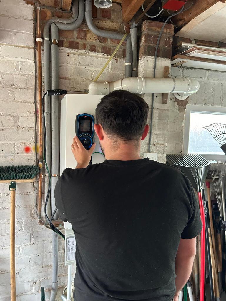 Luke inspecting boiler