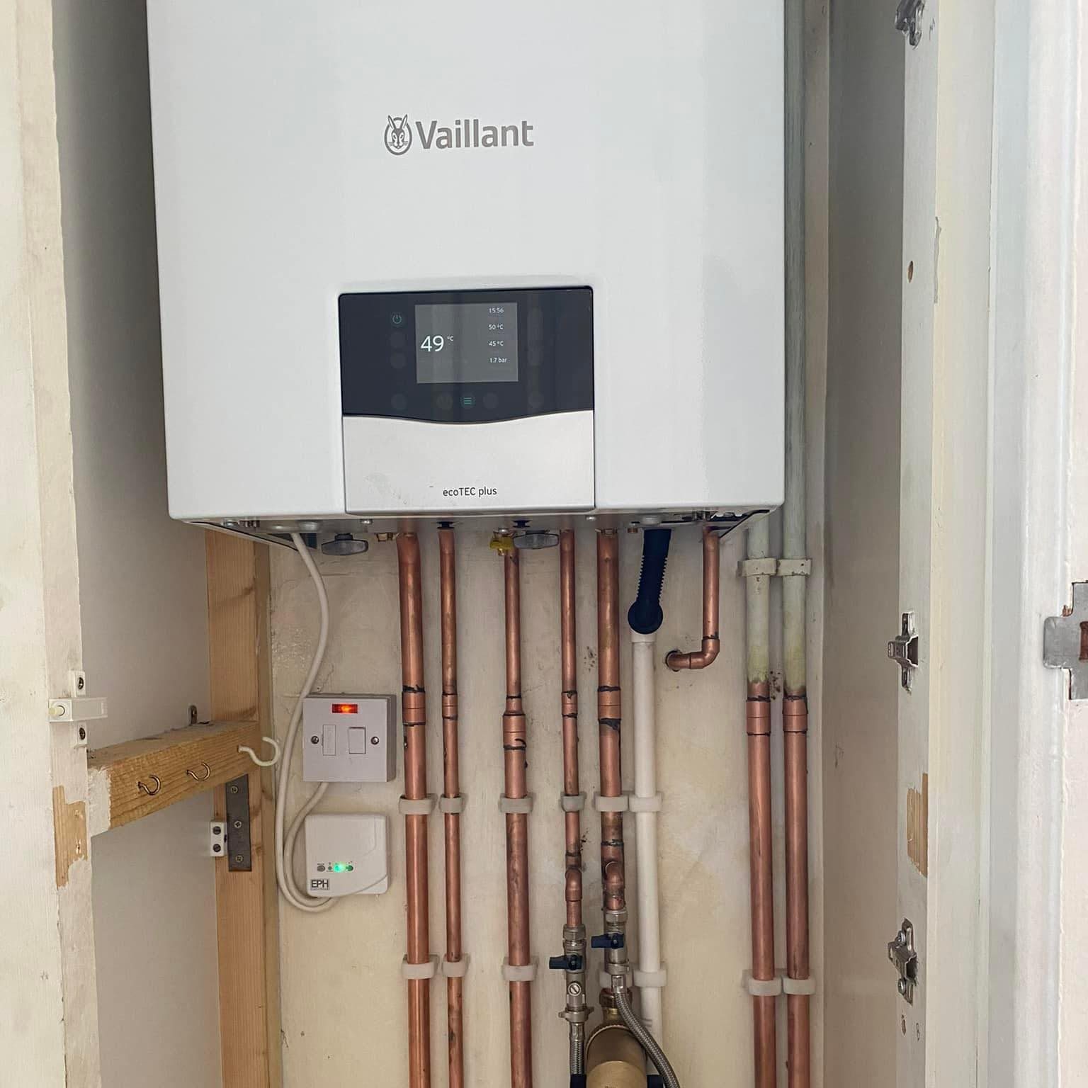 boiler with copper pipes underneath